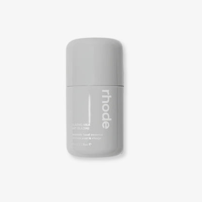 Gray bottle with 'rhode' branding on a white background